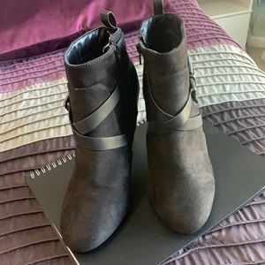 Black suede stiletto boots.